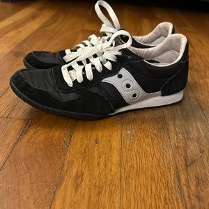 Black Saucony sneakers